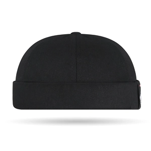 Classic black cotton twill Miki hat with minimalist rolled edge and small side label