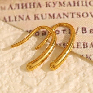 Élégantes boucles d'oreilles goutte d'or pour femmes au design métallique en U