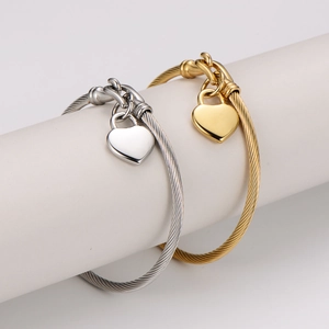 Elegant stainless steel wire cable bangles with heart charms in gold and silver finish