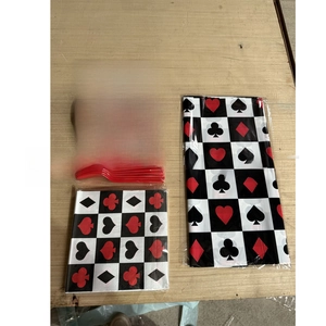 Detailed view of disposable poker themed party tableware set with cards pattern