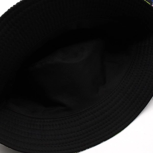 Reversible bucket hat with tropical leaf print and durable reinforced stitched brim