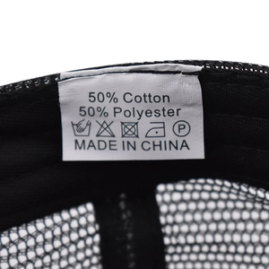 Detail of truck cap inner label showing 50% cotton 50% polyester blend fabric composition