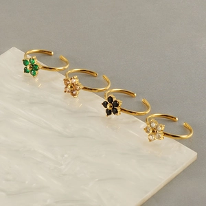 Adjustable golden flower rings with colorful zircon petals in emerald and champagne