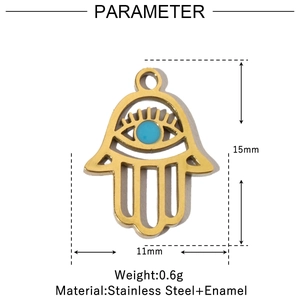 Detailed view of Hamsa Hand pendant in gold stainless steel and blue enamel