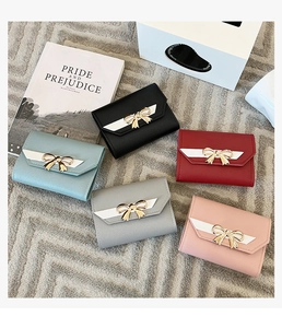 Short tri-fold wallets for women in five colors with metal bow and contrast stitching