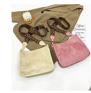 Flat lay of retro beige and pink tote bags with stylish leopard print wide straps