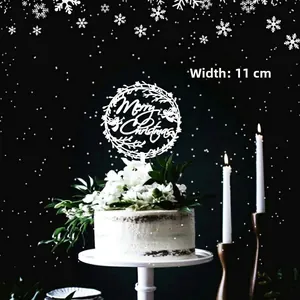 White Christmas cake topper with Merry Christmas text in 11cm width on floral cake