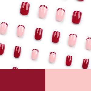 Short square press-on nails set in deep wine red and pink French tip design