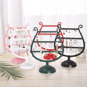 Five harp-shaped multi-color jewelry organizers for necklaces and earrings storage