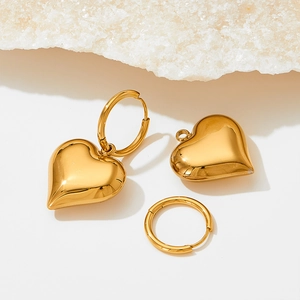 Minimalist 3D heart drop earrings in polished gold finish with stainless steel hoops