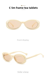 Detail of oval sunglasses with cream frames, tea lenses, and hollowed-out side design