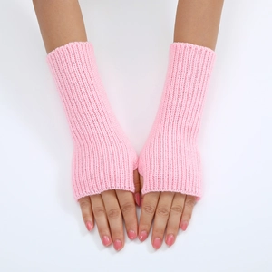 Detail view of pink knitted fingerless gloves showing striped texture and wrist length