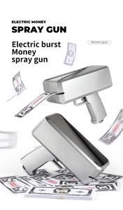 Electric money spray gun with silver metallic finish and stack of prop banknotes