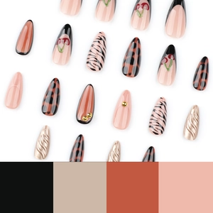 Handcrafted almond nails with 3D cherry accents, zebra prints, and gold bead details