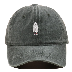 Close-up of cute ghost embroidery with sunglasses on a dark gray washed cotton baseball cap