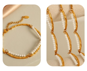 Detail of 18K gold plated titanium bracelet featuring white pearls and wavy metal frame