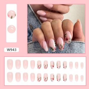 Detailed set of almond press-on nails with nude pink base and floral pattern W943