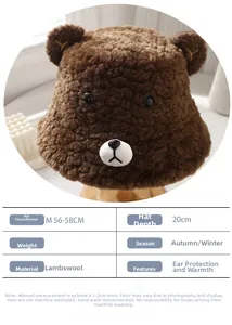 Detailed view of plush bear bucket hat with soft fleece texture and cute embroidered face