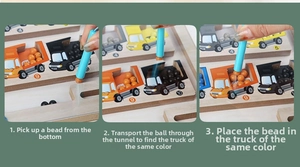 Detailed view of using a magnetic pen to sort colorful beads into numbered train cars