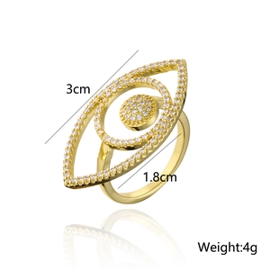 Macro view of 18K gold plated copper ring showing dimensions and eye-shaped design details