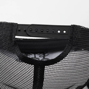 Detailed view of the adjustable black plastic snapback closure and breathable mesh