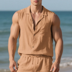 Detail of men's linen sleeveless shirt and shorts set in apricot on a beach background