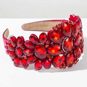 Detailed macro of vintage wide velvet headband with red crystals and silver rhinestones