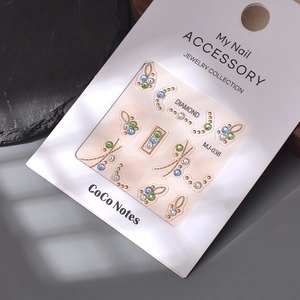 Nail art rhinestone jewelry set with assorted colorful crystals and gold borders