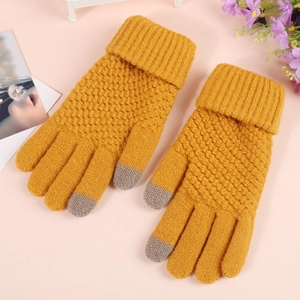 Close-up of ginger yellow knit gloves featuring touch-screen tips and ribbed cuffs