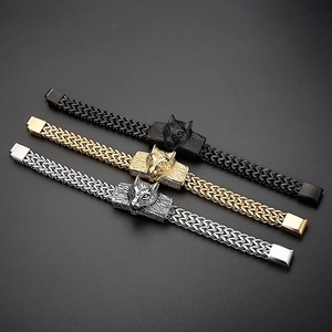 Men's hip-hop wolf head bracelets in black, gold, and silver finishes on a grey background