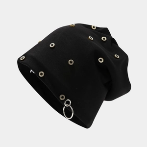 Hip-hop black knit beanie featuring decorative metal floral studs and silver rings