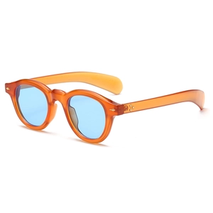 Retro round orange acetate sunglasses with blue lenses and star metal rivets