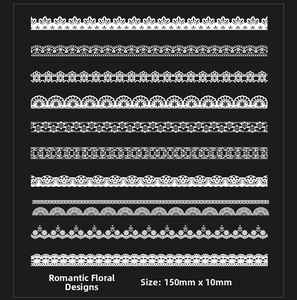 Detailed view of 11 white lace border stickers featuring diverse floral cutout patterns