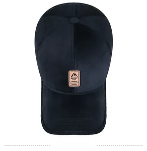 Top view of men's winter baseball cap showing textured warm fabric and leather sport patch