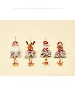 Set of four plush Christmas ornaments with Santa, Reindeer, Snowman, and Bear bells