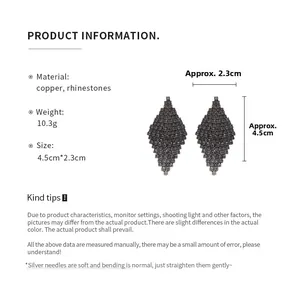 Detail showing dimensions of diamond-shaped rhinestone earrings with silver needles