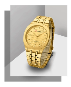 Detail of square-round gold stainless steel watch face with Curren logo and markers