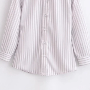 Women's vertical striped shirt with shoulder pads and button-front closure in light purple