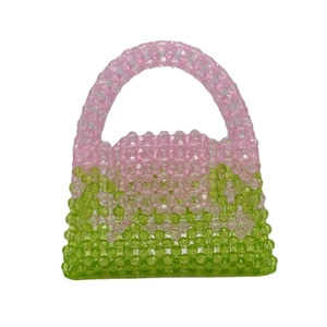 Handmade beaded handbag with pink and green acrylic beads in a color-block flap design