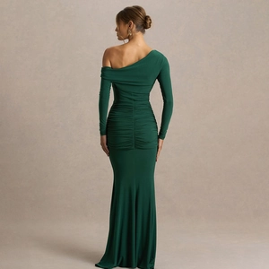 Elegant green one-shoulder mermaid evening gown with pleats and a long trailing ribbon
