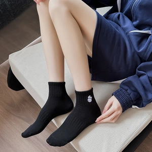 Women's cotton black crew socks with panda embroidery and ribbed knit texture