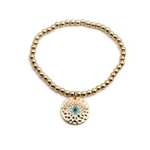 Gold-plated beaded evil eye bracelet with blue enamel charm on white background