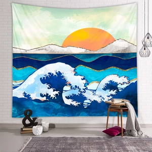 Detailed view of mountain and ocean wave tapestry on white brick wall in living room