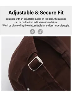 Detail of dark brown baseball cap with adjustable silver metal buckle on cotton fabric