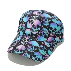 Detail of blue purple gradient skull patterns and stars on black baseball cap