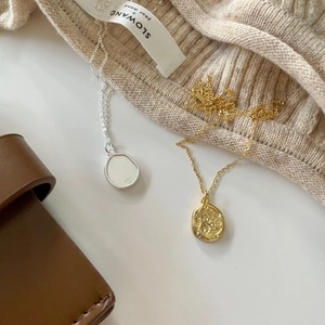 925 sterling silver irregular letter necklace with a vintage coin relief pendant