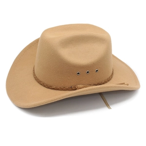 Close-up of khaki wool cowboy hat featuring a braided band and metal ventilation eyelets