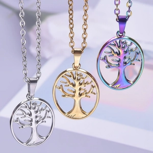 Three minimalist Tree of Life necklaces in gold, silver, and iridescent steel finishes