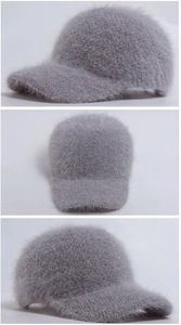 Macro view showing the soft plush texture and gray knit lining of the winter baseball cap