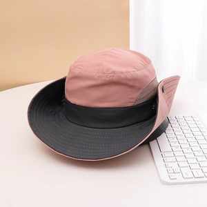 Detail view of pink sun hat with breathable side mesh and adjustable brim snap button